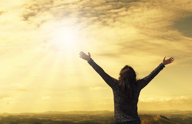 Christian backslider Woman lifts hand up to Jesus